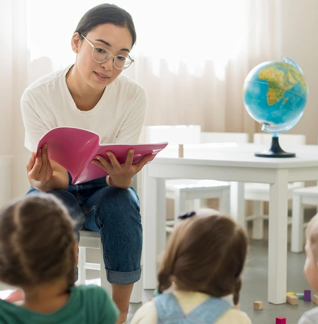Teacher reading to kids
